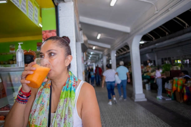 Person drinking slushie you can find on Gecko