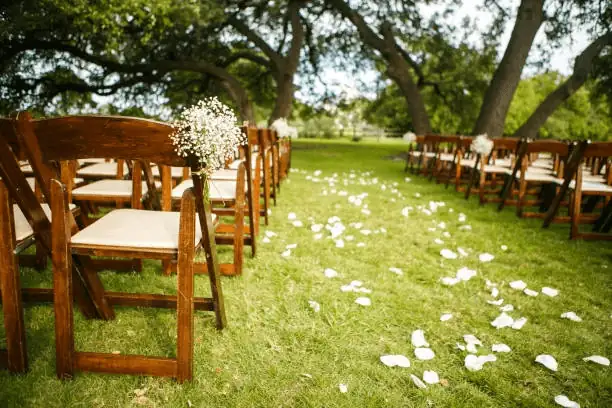 Brown Wooden Wedding Chair with Flowers you can find on Gecko